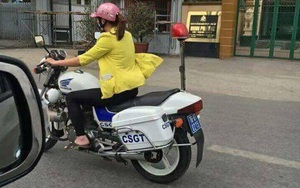 Cô gái đi dép lê lái xe đặc chủng của CSGT: 'Chắc chúng tôi phải đề nghị cho ngồi sau'