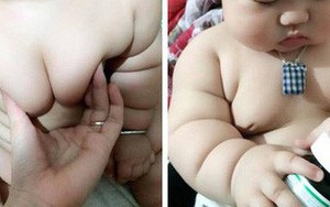 Cậu bé bú sữa mẹ hoàn toàn, 8 tháng nặng 16kg, tay chân đầy ngấn