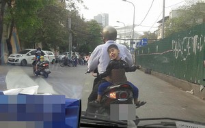 Với biểu cảm đặc biệt sau xe bố, đây là cậu bé được nhắc tới nhiều nhất trong ngày