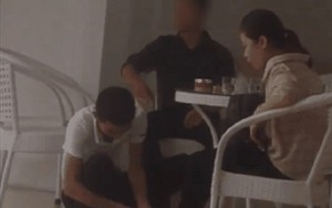Sau cơn mưa, clip ghi lại cảnh chàng trai ngồi xổm lau dép, lau chân cho bạn gái gây tranh cãi