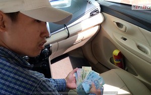 Tài xế taxi tráo 500 ngàn thành 20 ngàn sẽ bị xử lý thế nào?