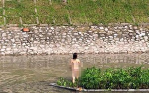 Cô gái cởi đồ bơi ra sông Tô Lịch nhảy nhót có dấu hiệu tâm lý không ổn định