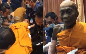 Qua đời đã 2 tháng, cao tăng vẫn "mỉm cười" khi được dựng dậy thay áo mới