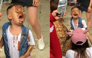 Hình ảnh hài nhất thứ Hai: Cậu bé "khóc hết nước mắt" vì lỡ in mặt lên người VĐV thể hình