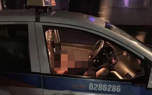 Một phụ nữ trọng thương ở ghế lái taxi, người đàn ông lao từ trong xe ra ngoài tự tử