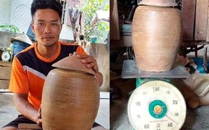 Một người dân Nghệ An phát hiện hũ tiền cổ nặng 36 kg khi đào móng nhà