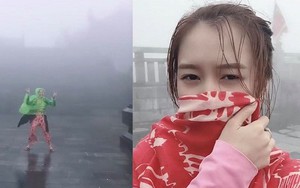 Đời thuở đi du lịch khổ nhất là thời tiết ngang trái, mưa gió “quật” bay người vẫn phải mỉm cười đi tiếp như cô gái này
