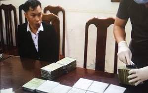 Hà Nội bắt giữ vụ vận chuyển 20 bánh heroin trên đường từ Lào Cai sang Trung Quốc