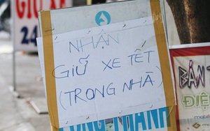 Dịch vụ giữ xe máy xuyên Tết cho người dân rời Sài Gòn về quê hốt tiền triệu mỗi ngày