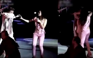 Hình ảnh Đàm Vĩnh Hưng bị tấn công bằng bình xịt hơi cay, Mỹ Tâm lao lên bảo vệ bất ngờ gây sốt