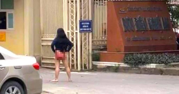 Người phụ nữ lột quần đứng chửi bới trước cổng trụ sở Bưu ...