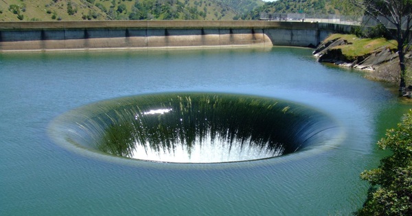 Not a Photoshop image, these water holes are real on Earth, but where do they flow?