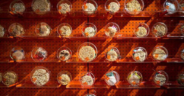 The store displays and processes hundreds of types of instant noodles that attract young Thai people