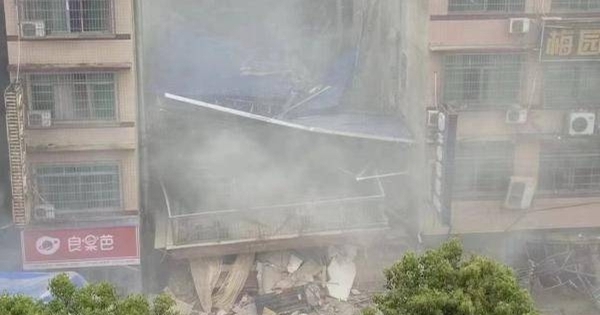 Nearly 60 people are trapped and missing in a house collapse in China