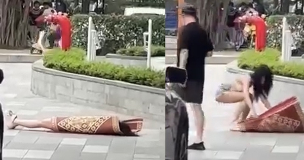 Clip hot girl có hành động khó hiểu, nằm đắp chiếu giữa sảnh chung cư đông người