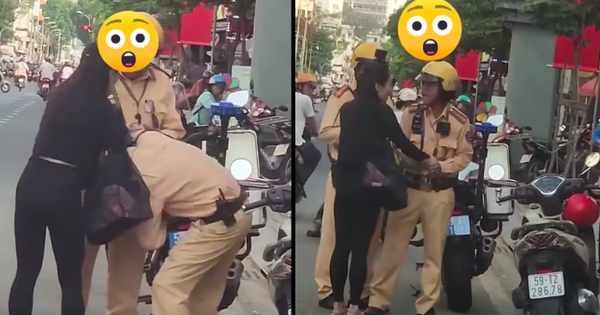 Giằng co với 2 CSGT giữa phố, giật tờ giấy xanh: Cô gái giải thích