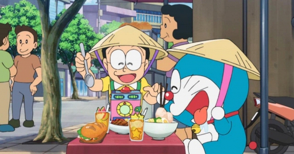 Đưa cảnh Nobita ngồi ghế nhựa ăn cơm tấm lên phim, ê-kíp Doraemon hé lộ nguyên nhân viết sai tên đặc sản Việt