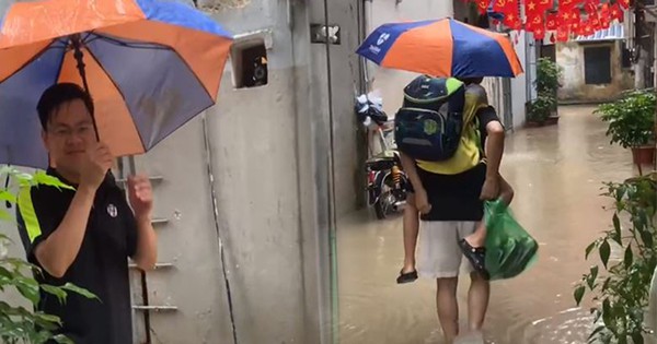Nhiều tuyến phố Hà Nội ngập sâu, bố lội nước 3 lượt cõng con đến lớp