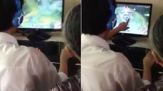 Bật cười cảnh cháu trai luyện game online cho bà