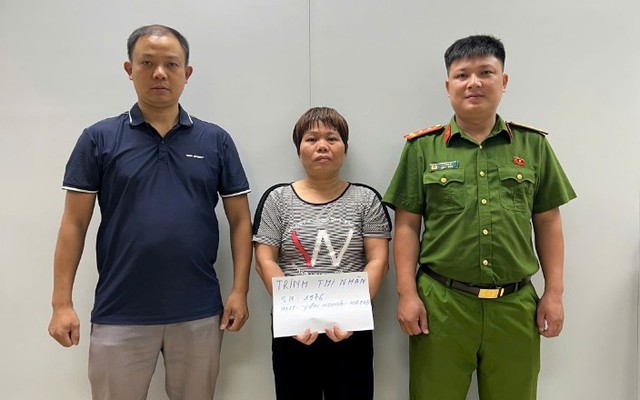Lê Thị Nhàn 50 tuổi về Việt Nam đầu thú
