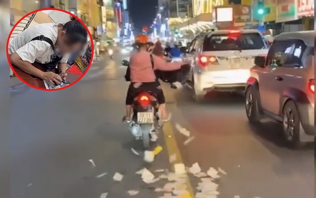 Người phụ nữ rải giấy tiền tứ tung ra giữa đường ở TP.HCM: Bất ngờ nguồn cơn và cái kết