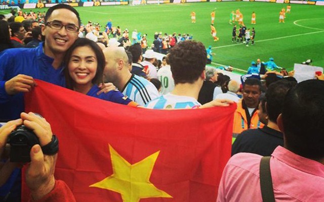 Vợ chồng Tăng Thanh Hà bị phản ứng vì cầm ngược cờ Tổ quốc