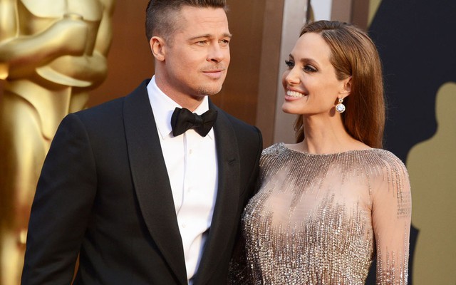 Angelina Jolie - Brad Pitt không rời nhau trên thảm đỏ Oscar