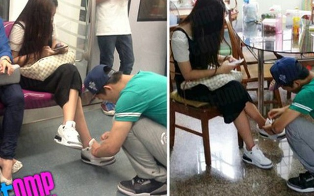 Chàng trai buộc dây giày cho người yêu trong khi cô gái "dán mắt" vào điện thoại