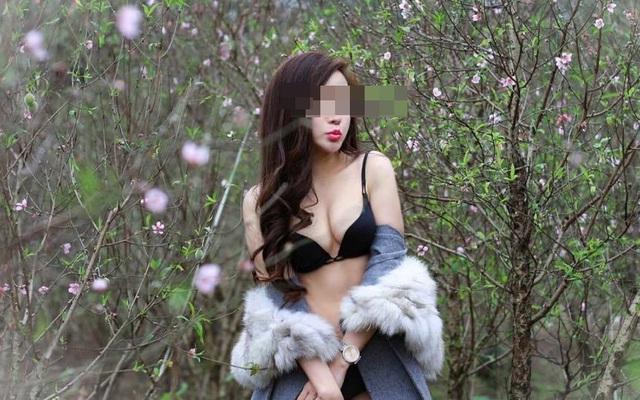 Cô gái mặc bikini tạo dáng giữa vườn đào gây tranh cãi