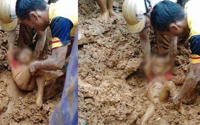 Bé trai bị vùi lấp trong bùn đất sau mưa lũ ở Thanh Hóa