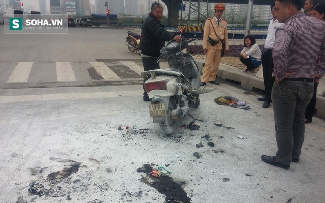 Người phụ nữ bỏ xe chạy thoát thân trong lúc chờ đèn đỏ ở Hà Nội