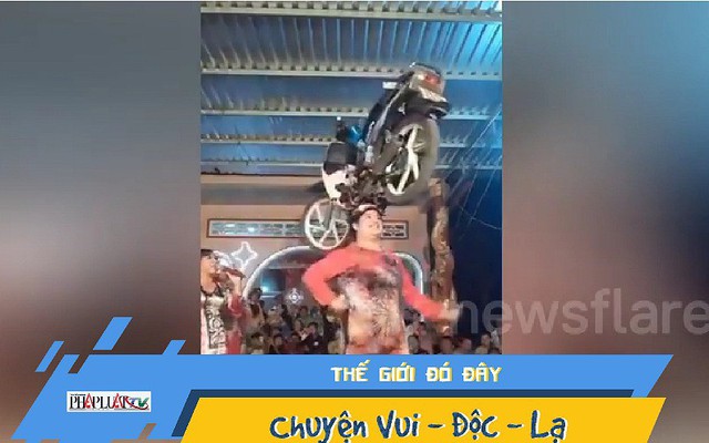 Video: Mặc áo dài, vừa múa vừa đội xe máy lên đầu gây sốt